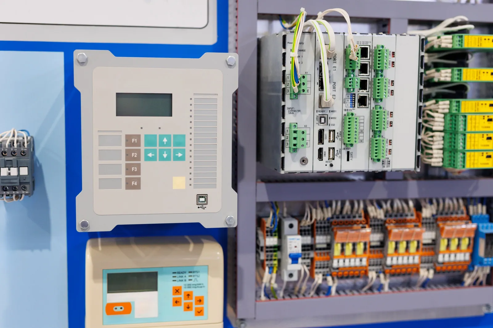 Control panel with controllers and terminal blocks
